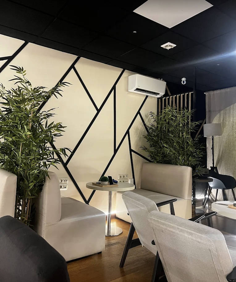 The Hood Social Club — Relaxation lounge with plants